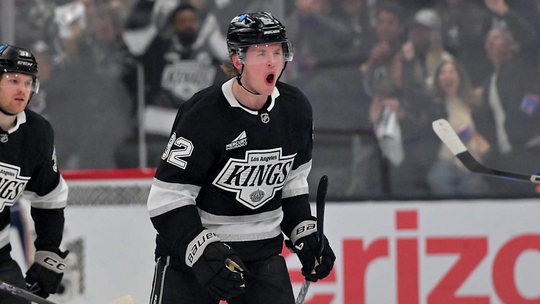 Apr 23, 2025; Los Angeles, California, USA;  Los Angeles Kings defenseman Brandt Clarke (92) celebrates after scoring a goal past Edmonton Oilers goaltender Stuart Skinner (74) in the first period of game 2 of the 2025 Stanley Cup Playoffs at Crypto.com Arena. Mandatory Credit: Jayne Kamin-Oncea-Imagn Images