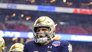 Jan 1, 2022; Glendale, Arizona, USA; Notre Dame Fighting Irish tight end Kevin Bauman (84) against the Oklahoma State Cowboys in the 2022 Fiesta Bowl at State Farm Stadium. Mandatory Credit: Mark J. Rebilas-Imagn Images
