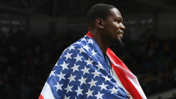 Aug 21, 2016; Rio de Janeiro, Brazil; USA forward Kevin Durant (5) celebrates winning the gold medal in the men's gold game during the during the Rio 2016 Summer Olympic Games at Carioca Arena 1. Mandatory Credit: RVR Photos-USA TODAY Sports