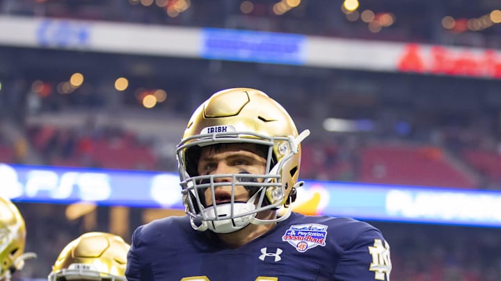 Jan 1, 2022; Glendale, Arizona, USA; Notre Dame Fighting Irish tight end Kevin Bauman (84) against the Oklahoma State Cowboys in the 2022 Fiesta Bowl at State Farm Stadium. Mandatory Credit: Mark J. Rebilas-Imagn Images
