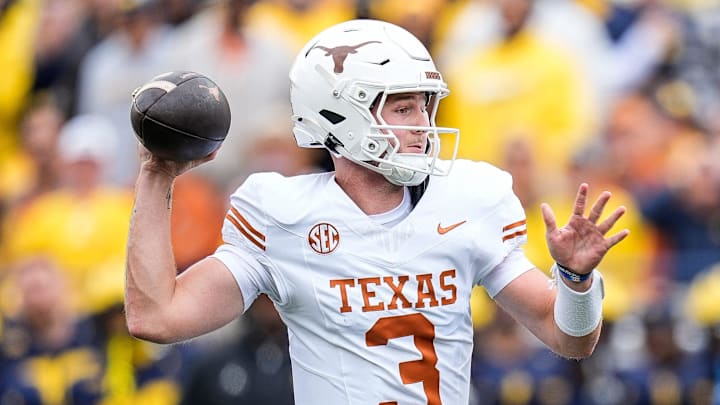 Sep 7, 2024; Ann Arbor, Michigan, USA; Texas quarterback Quinn Ewers (3) makes a pass against Michigan at Michigan Stadium. Mandatory Credit: Junfu Han-USA TODAY Network via Imagn Images