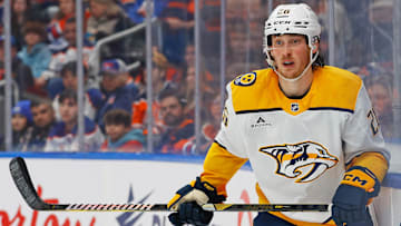 Nov 14, 2024; Edmonton, Alberta, CAN;  Nashville Predators forward Philip Tomasino (26) follows the play against the Edmonton Oilers at Rogers Place. Mandatory Credit: Perry Nelson-Imagn Images
