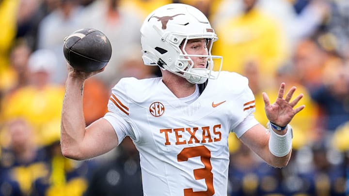 Texas quarterback Quinn Ewers (3) makes a pass against Michigan during the first half at Michigan Stadium in Ann Arbor on Saturday, September 7, 2024.