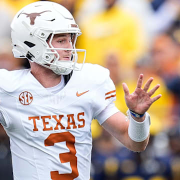 Texas quarterback Quinn Ewers (3) makes a pass against Michigan during the first half at Michigan Stadium in Ann Arbor on Saturday, September 7, 2024.