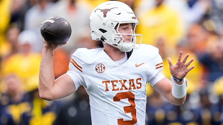 Texas quarterback Quinn Ewers (3) makes a pass against Michigan during the first half at Michigan Stadium in Ann Arbor on Saturday, September 7, 2024.