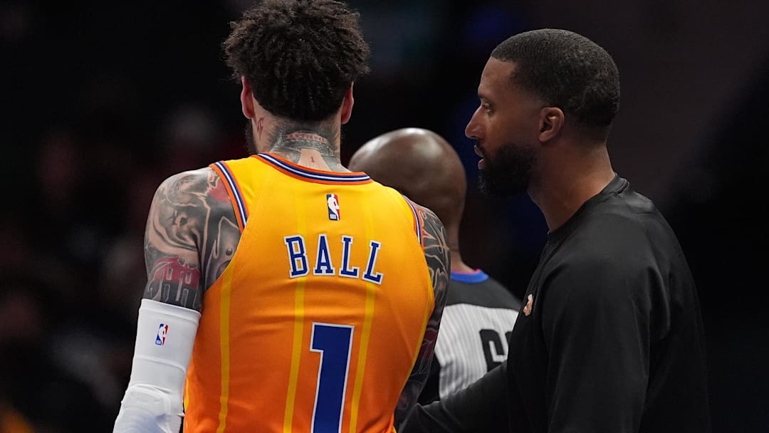 Apr 10, 2026; Charlotte, North Carolina, USA; Charlotte Hornets Head Coach Charles Lee talks with guard LaMelo Ball (1) during a time out during first quarter against the Detroit Pistons at Spectrum Center. Mandatory Credit: Jim Dedmon-Imagn Images