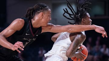 Vanderbilt Commodores guard Jason Edwards (1) gets by Maryland-Eastern Shore Hawks forward Jalen Ware (24) during their game at Memorial Gym in Nashville, Tenn., Monday, Nov. 4, 2024.
