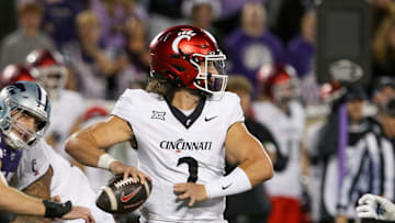 Nov 23, 2024; Manhattan, Kansas, USA; Cincinnati Bearcats quarterback Brendan Sorsby (2) drops back to pass during the fourth quarter against the Kansas State Wildcats at Bill Snyder Family Football Stadium. Mandatory Credit: Scott Sewell-Imagn Images