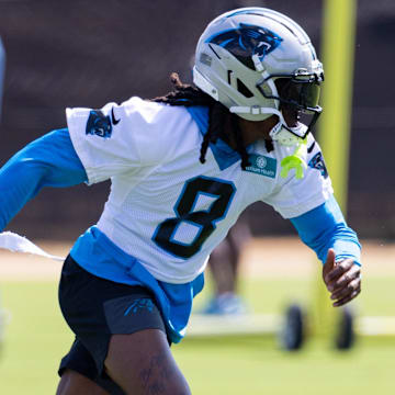 Carolina Panthers cornerback Jaycee Horn (8) runs drills during training camp.