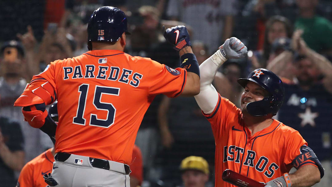 Jun 5, 2025; Pittsburgh, Pennsylvania, USA;  Houston Astros designated hitter Jose Altuve (right) congratulates  third baseman Isaac Paredes (15) on his solo home run against the Pittsburgh Pirates during the fourth inning at PNC Park