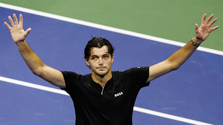 Taylor Fritz reacts after defeating Frances Tiafoe to reach the final of the 2024 US Open at Arthur Ashe Stadium on Friday night.