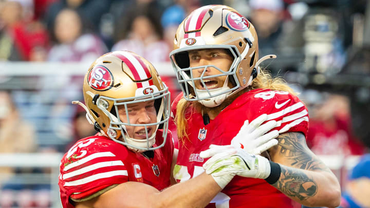 San Francisco 49ers running back Christian McCaffrey (L) and tight end George Kittle (R)