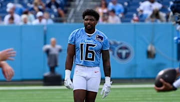 Tennessee Titans wide receiver Treylon Burks (16) warms up during “Back Together Weekend” training camp practice at Nissan Stadium Saturday, July 26, 2025, in Nashville, Tenn.