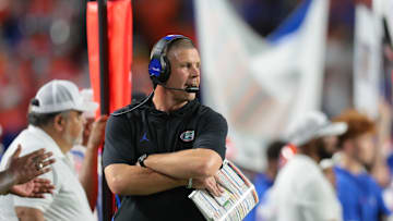 Sep 20, 2025; Miami Gardens, Florida, USA; Florida Gators head coach Billy Napier watches from the sideline against the Miami Hurricanes during the third quarter at Hard Rock Stadium. Mandatory Credit: Sam Navarro-Imagn Images