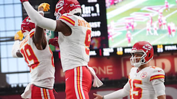 Kansas City Chiefs receiver Jason Brownlee (89) celebrates his touchdown with teammates JuJu Smith-Schuster (9) and Patrick Mahomes (15) during their preseason game against the Arizona Cardinals at State Farm Stadium on Aug. 9, 2025.