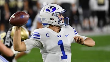 Dec 22, 2020; Boca Raton, Florida, USA; Brigham Young Cougars quarterback Zach Wilson (1) attempts a pass against the UCF Knights during the first half at FAU Stadium. Mandatory Credit: Jasen Vinlove-Imagn Images