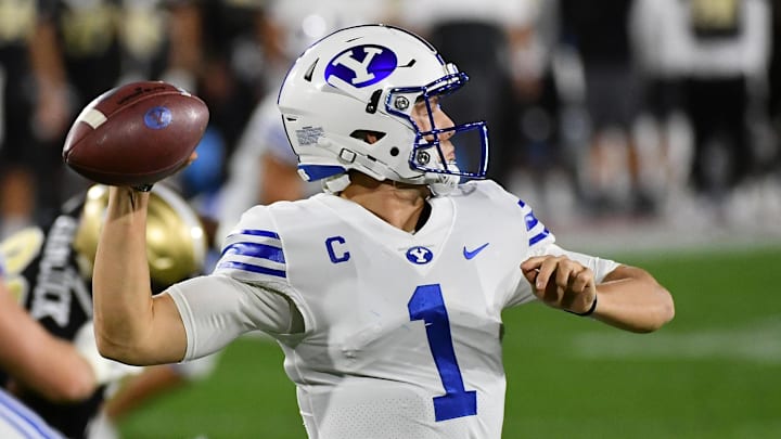 Dec 22, 2020; Boca Raton, Florida, USA; Brigham Young Cougars quarterback Zach Wilson (1) attempts a pass against the UCF Knights during the first half at FAU Stadium. Mandatory Credit: Jasen Vinlove-Imagn Images