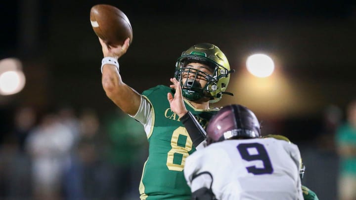 Knoxville Catholic Jayden Neal (8) passes the ball against Lipscomb Academy during the first half at Catholic High School in Knoxville, TN on Friday, October 13, 2023.