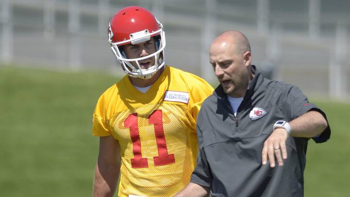May 15, 2013; Kansas City, MO, USA; Kansas City Chiefs quarterback Alex Smith (11) talks with