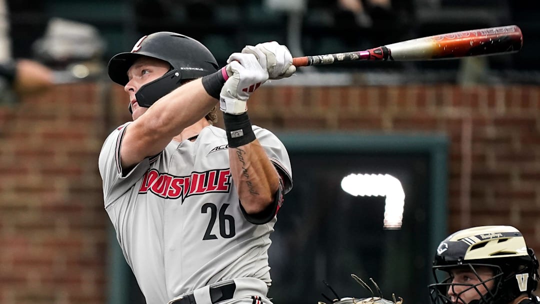 Louisville catcher Jimmy Nugent (26) hits a grand slam home run against Vanderbilt during the first inning at Hawkins Field in Nashville, Tenn., Tuesday, May 5, 2026.