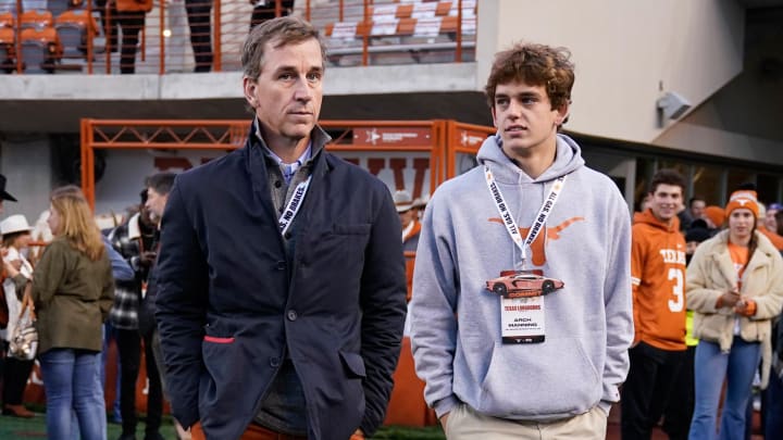 Nov 12, 2022; Austin, Texas, USA; Texas Longhorns quarterback recruit Arch Manning along with his father Cooper Manning on the sidelines before the game against the Texas Christian Horned Frogs at Darrell K Royal-Texas Memorial Stadium. Mandatory Credit: Scott Wachter-USA TODAY Sports