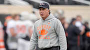 Head coach Mike Gundy walks on the field during an Oklahoma State spring football showcase at Boone Pickens Stadium in Stillwater, Okla., Saturday, April 19, 2025.