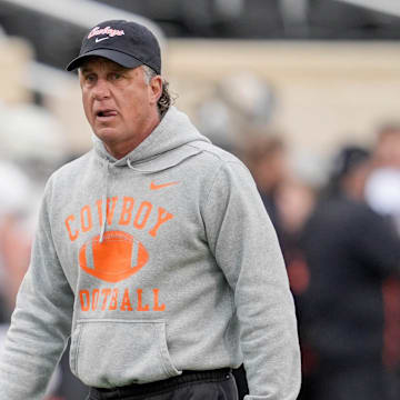 Head coach Mike Gundy walks on the field during an Oklahoma State spring football showcase at Boone Pickens Stadium in Stillwater, Okla., Saturday, April 19, 2025.