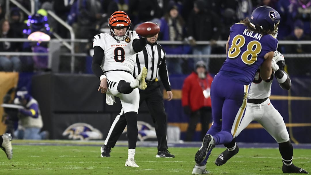 Nov 27, 2025; Baltimore, Maryland, USA; Cincinnati Bengals punter Ryan Rehkow (8) punts the ball against the Baltimore Ravens during the first half at M&T Bank Stadium. Mandatory Credit: Tommy Gilligan-Imagn Images