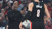 Oct 22, 2025; Portland, Oregon, USA;  Portland Trail Blazers head coach Chauncey Billups talks with Portland Trail Blazers forward Deni Avdija (8) in a game against the Minnesota Timberwolves at Moda Center. Mandatory Credit: Jaime Valdez-Imagn Images