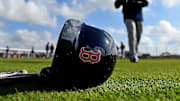 Feb 18, 2019; Lee County, FL, USA; A general view of a Boston Red Sox helmet as Boston Red Sox center fielder Jackie Bradley Jr. (19) walks on the field during a spring training workout at Jet Blue Park at Fenway South. Mandatory Credit: Jasen Vinlove-Imagn Images