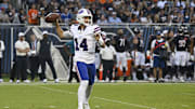 Aug 17, 2025; Chicago, Illinois, USA; Buffalo Bills quarterback Mike White (14) throws during the first half against the Chicago Bears at Soldier Field. 