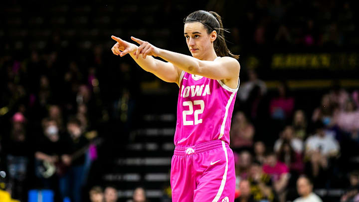 Iowa guard Caitlin Clark (22) points to a teammate while checking into the game during a NCAA Big Ten Conference women's basketball game against Rutgers, Sunday, Feb. 12, 2023, at Carver-Hawkeye Arena in Iowa City, Iowa.