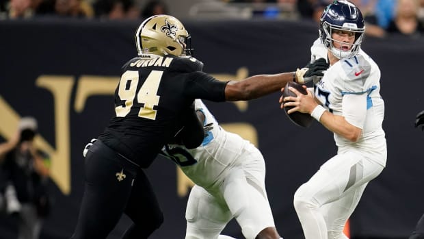 New Orleans Saints defensive end Cameron Jordan (94) puts pressure on Tennessee Titans quarterback Ryan Tannehill (17) 