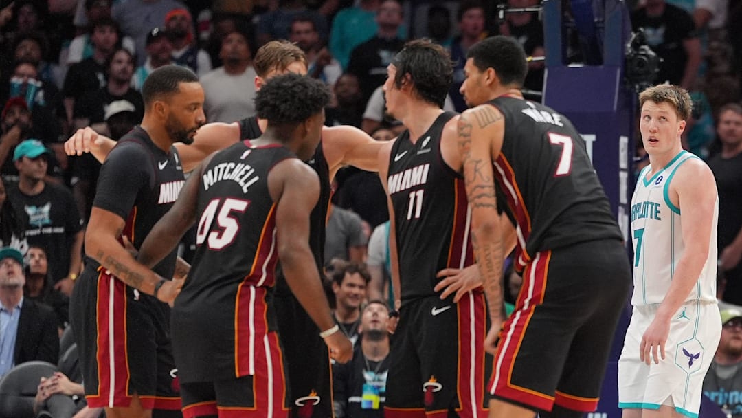 Apr 14, 2026; Charlotte, North Carolina, USA; Both teams look on after a time out during the second half during the play-in rounds between the Charlotte Hornets and the Miami Heat of the 2026 NBA Playoffs at Spectrum Center. Mandatory Credit: Jim Dedmon-Imagn Images