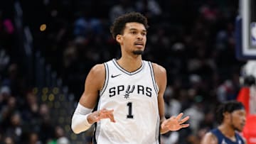 Feb 10, 2025; Washington, District of Columbia, USA; San Antonio Spurs center Victor Wembanyama (1) reacts after making a three point field goal during the first quarter against the Washington Wizards at Capital One Arena. Mandatory Credit: Reggie Hildred-Imagn Images