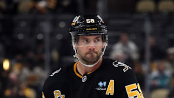 Jan 7, 2025; Pittsburgh, Pennsylvania, USA; Pittsburgh Penguins defenseman Kris Letang (58) looks on against the Columbus Blue Jackets during the third period at PPG Paints Arena. Mandatory Credit: Charles LeClaire-Imagn Images