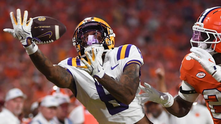 LSU Tigers wide receiver Barion Brown (6) goes for a catch while being defended by Clemson Tigers cornerback Ashton Hampton (23) Saturday, Aug. 30, 2025 during the NCAA football game at Memorial Stadium in Clemson, South Carolina. LSU Tigers won 17-10.