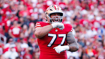 San Francisco 49ers right guard Dominick Puni (77)