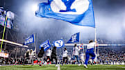 BYU runs out of the tunnel before the Cincinnati game