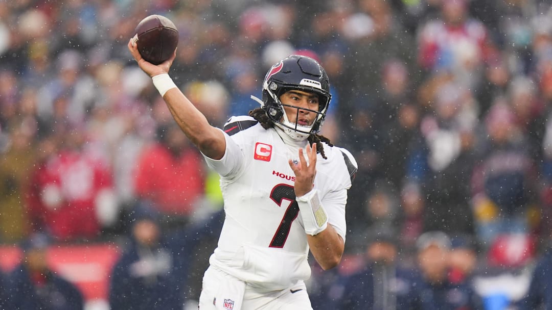 Jan 18, 2026; Foxborough, MA, USA; Houston Texans quarterback C.J. Stroud (7) throws in the first quarter against the New England Patriots in an AFC Divisional Round game at Gillette Stadium. Mandatory Credit: Brian Fluharty-Imagn Images