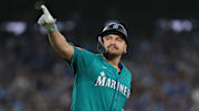 Oct 19, 2025; Toronto, Ontario, CAN; Seattle Mariners first baseman Josh Naylor (12) reacts after hitting a home run in the sixth inning against the Toronto Blue Jays during game six of the ALCS round for the 2025 MLB playoffs at Rogers Centre. Mandatory Credit: Nick Turchiaro-Imagn Images