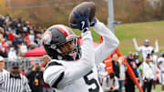 Aliquippa wide receiver Josh Lay catches a touchdown pass from Marques Council during the first half of the Quips' 21-12 win over McKeesport in the WPIAL Class 4A title game Saturday at Pine-Richland High School.