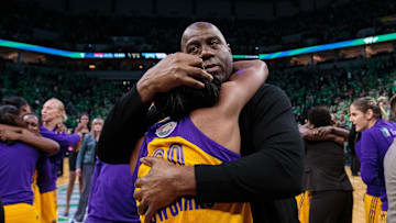 Oct 20, 2016; Minneapolis, MN, USA; Magic Johnson hugs Los Angeles Sparks forward Nneka Ogwumike (30) after the game against the Minnesota Lynx in game five of the WNBA Finals. at Target Center. The Los Angeles Sparks beat the Minnesota Lynx 77-76. Mandatory Credit: Brad Rempel-Imagn Images
