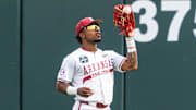 Arkansas Razorbacks center fielder Justin Thomas Jr. (4) catches for an out against the LSU Tigers during the first inning at Charles Schwab Field.
