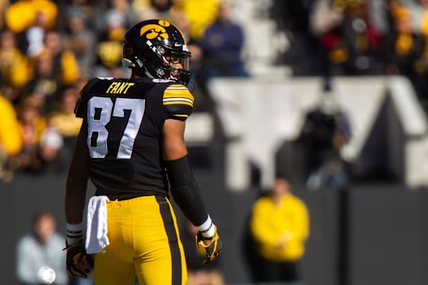 Iowa tight end Noah Fant (87) looks over his shoulder during an NCAA Big Ten conference football game.