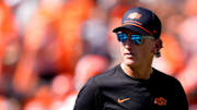 Oklahoma State Interim Head Coach/Offensive Coordinator Doug Meacham talks to players before the college football game between the Oklahoma State Cowboys and the Baylor Bears at Boone Pickens Stadium in Stillwater, Okla., Saturday, Sept. 27, 2025.