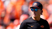 Oklahoma State Interim Head Coach/Offensive Coordinator Doug Meacham talks to players before the college football game between the Oklahoma State Cowboys and the Baylor Bears at Boone Pickens Stadium in Stillwater, Okla., Saturday, Sept. 27, 2025.