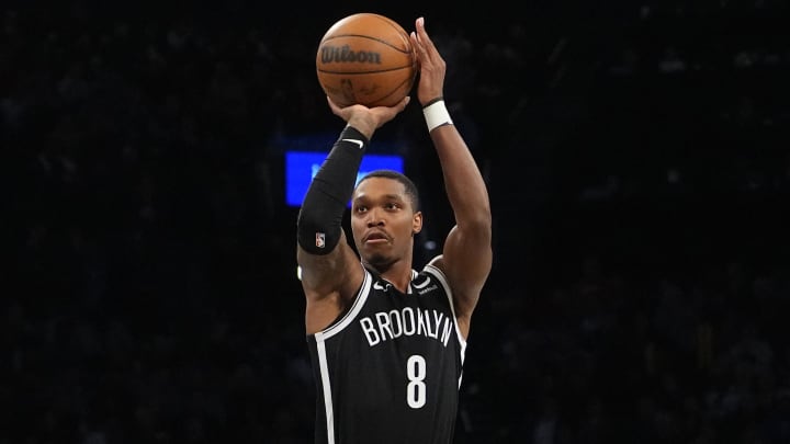 Feb 10, 2024; Brooklyn, New York, USA; Brooklyn Nets guard Lonnie Walker IV (8) shoots a three-point jump shot against the San Antonio Spurs during the second half at Barclays Center. Mandatory Credit: Gregory Fisher-USA TODAY Sports