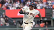 Jul 7, 2025; San Francisco, California, USA; San Francisco Giants designated hitter Rafael Devers (16) runs to third base during the third inning of the game against the Philadelphia Phillies at Oracle Park. Mandatory Credit: Ed Szczepanski-Imagn Images