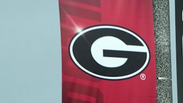 A street banner with the Georgia Bulldogs logo promoting the College Football National Championship.